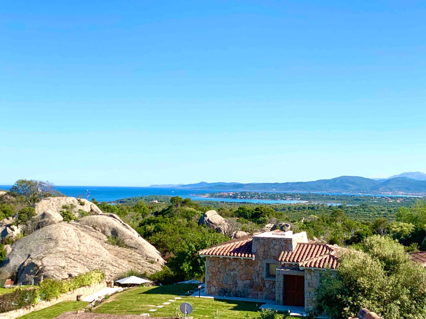 Stone villa terrace overlooking the Sardinian coast